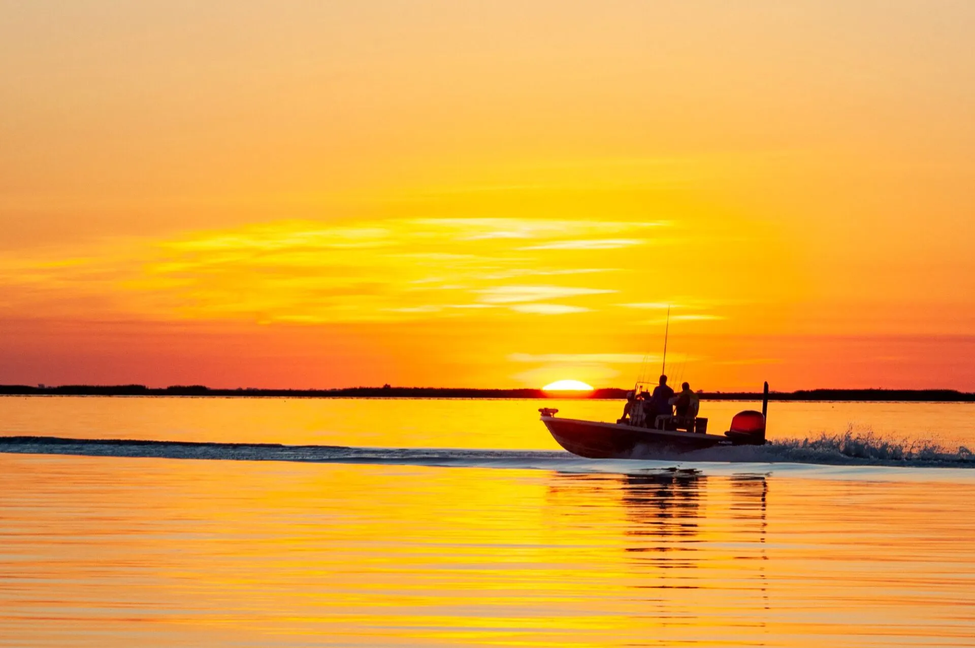 Sunrise over the grass flats of Lake Okeechobee, a top bass fishing lake in Florida.