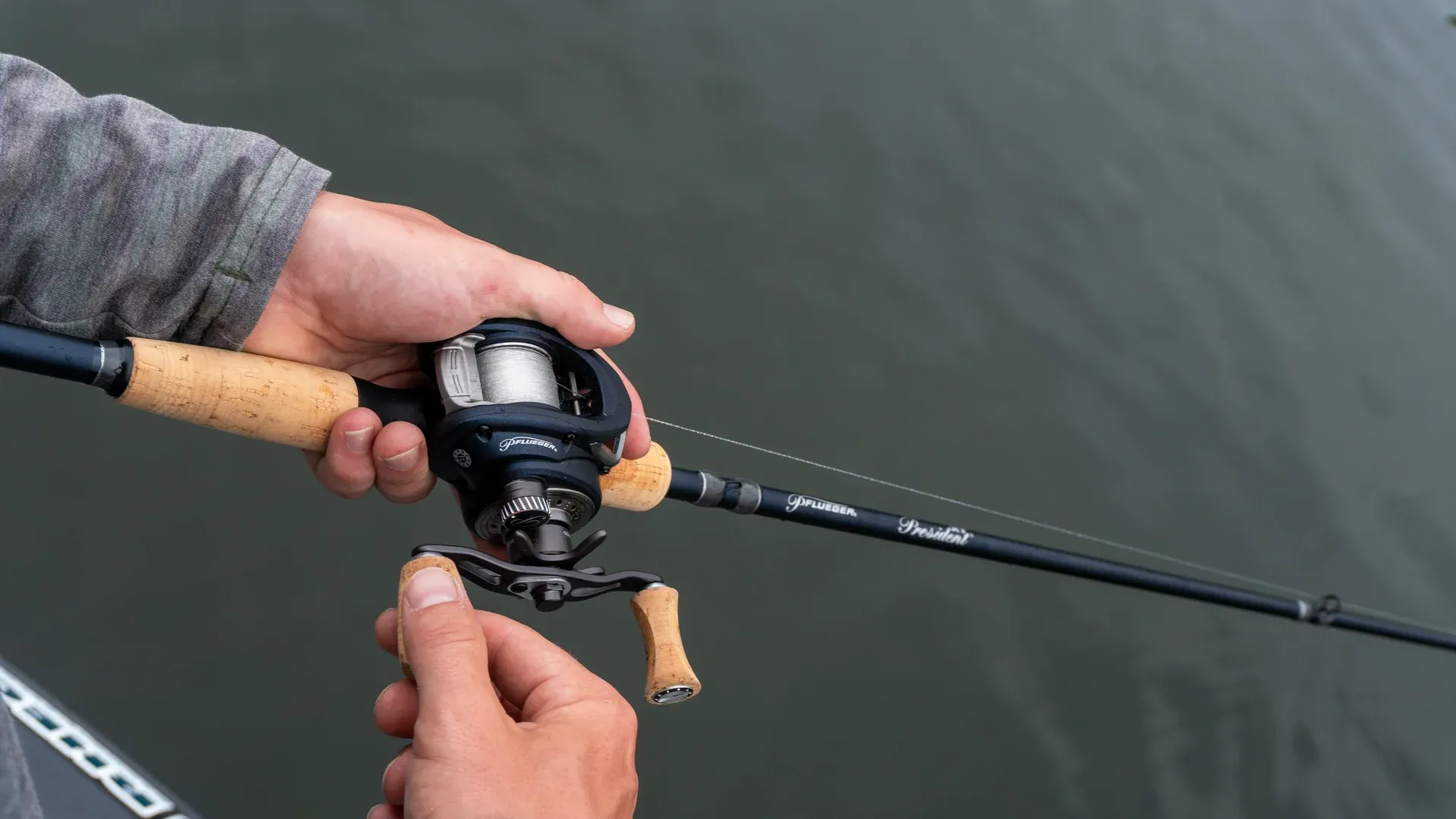 The Pflueger President XT reel, highlighting its aluminum main shaft and pinion gear