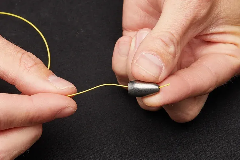 Step 1: Slide on Your Weight & Bead on how to fig a texas rig for bass