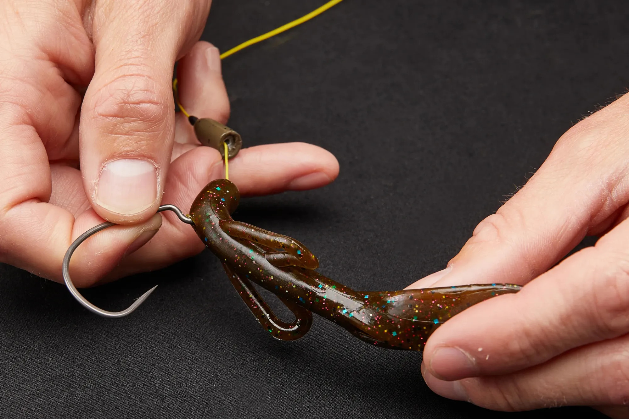 Step 3: Thread the Bait's Nose on how to fig a texas rig for bass
