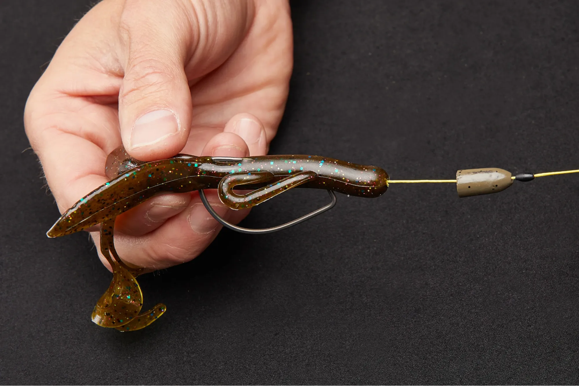 Step 4: Rotate and "Tex-Pose" the Hook on how to fig a texas rig for bass